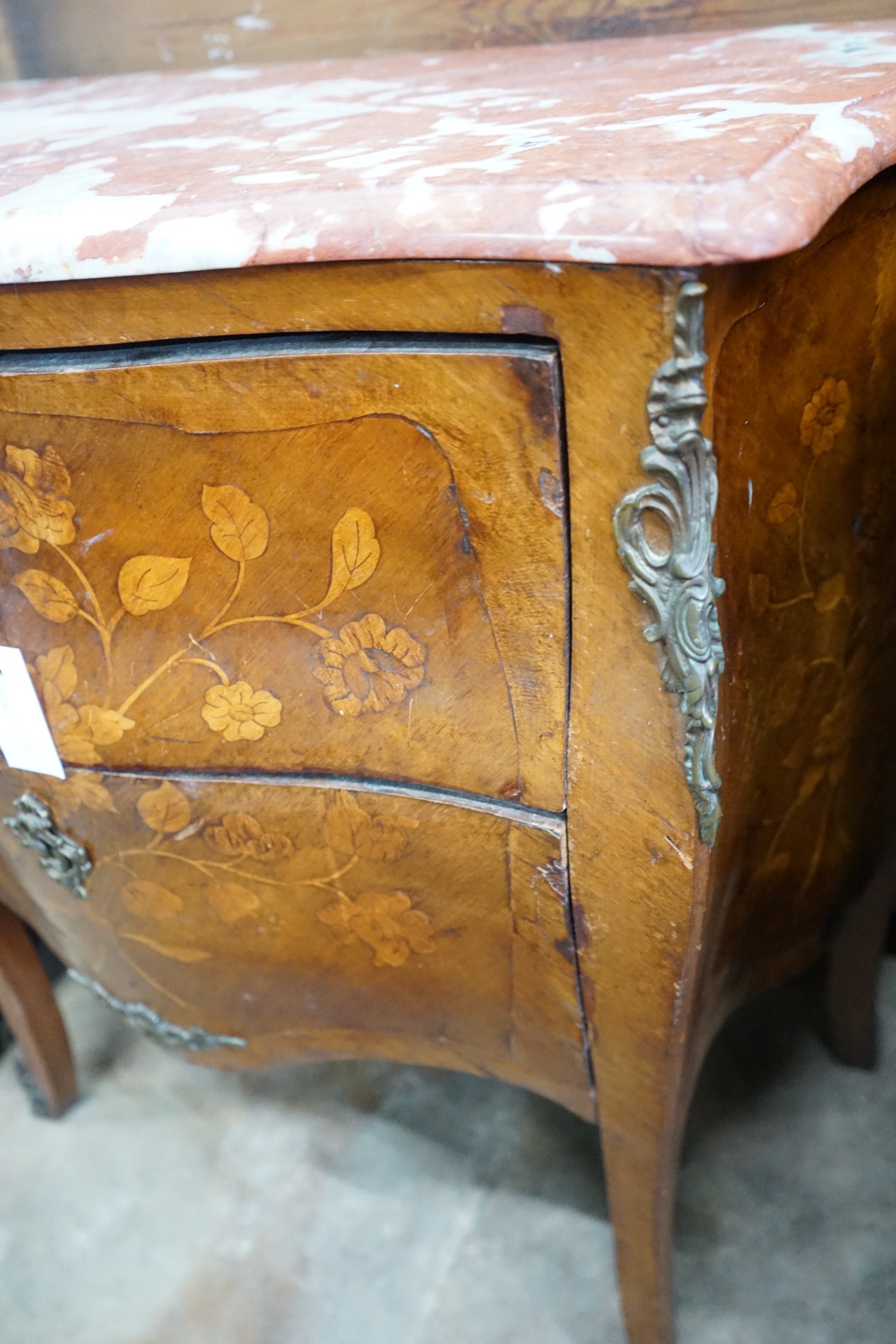 A Louis XVI style marquetry inlaid gilt metal mounted marble top bombe commode, width 83cm, depth 44cm, height 84cm